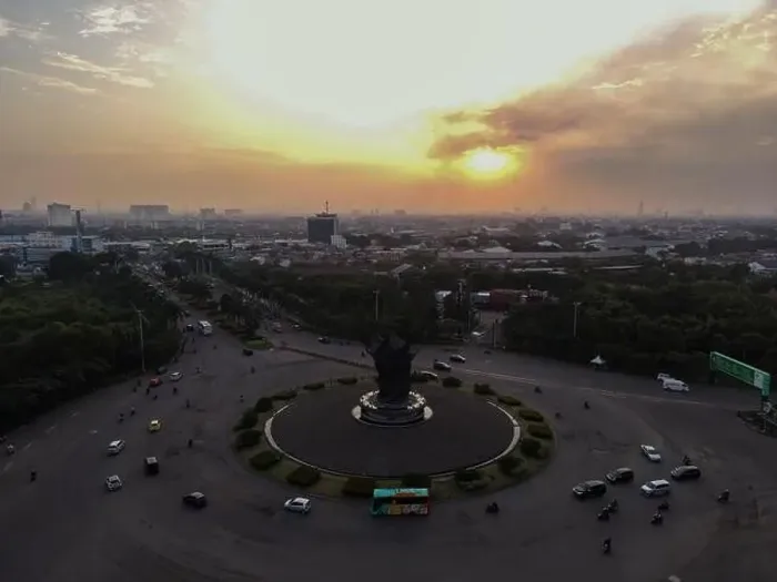 Framed Print : Aerial top down of traffic in Bekasi roundabout during sunny day. Cars passing road. Bekasi. Indonesia. May, 6 2021 Framed Print : Aerial top down of traffic in Bekasi roundabout during sunny day. Cars passing road. Bekasi. Indonesia. May, 6 2021