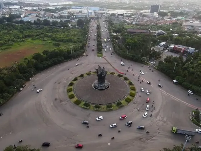 Framed Print : Aerial top down of traffic in Bekasi roundabout during sunny day. Cars passing road. Bekasi. Indonesia. May, 6 2021 Framed Print : Aerial top down of traffic in Bekasi roundabout during sunny day. Cars passing road. Bekasi. Indonesia. May, 6 2021