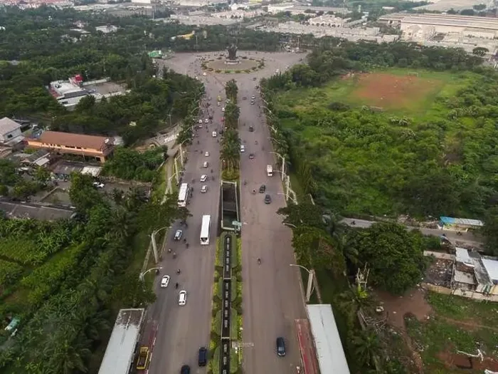 Framed Print : Aerial top down of traffic in Bekasi roundabout during sunny day. Cars passing road. Bekasi. Indonesia. May, 6 2021 Framed Print : Aerial top down of traffic in Bekasi roundabout during sunny day. Cars passing road. Bekasi. Indonesia. May, 6 2021