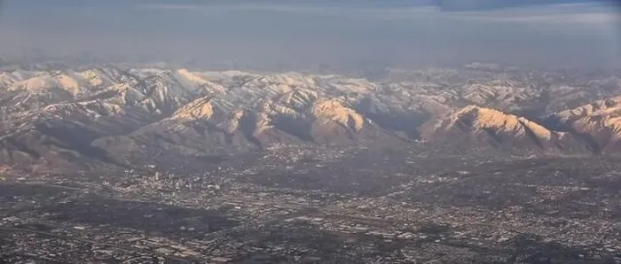 Framed Print : Aerial view from airplane of the Wasatch Front Rocky Mountain Range with snow capped peaks in winter including urban Framed Print : Aerial view from airplane of the Wasatch Front Rocky Mountain Range with snow capped peaks in winter including urban