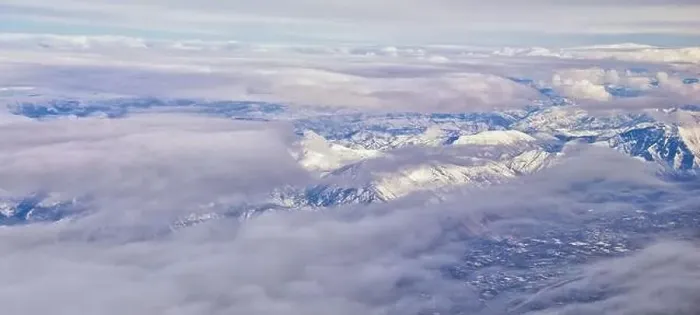 Framed Print : Aerial view from airplane of the Wasatch Front Rocky Mountain Range with snow capped peaks in winter including urban Framed Print : Aerial view from airplane of the Wasatch Front Rocky Mountain Range with snow capped peaks in winter including urban