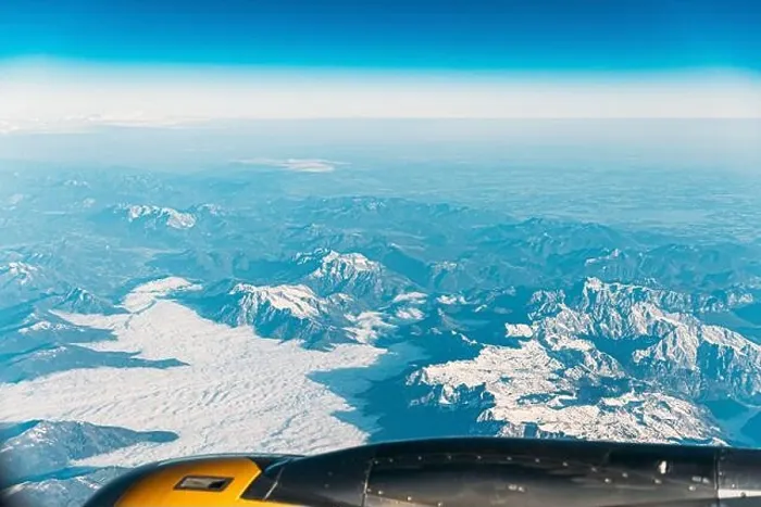 Framed Print : Aerial View From Airplane Window On Snowy Top Of Tatra Mountains In Summer Day. High Attitude Framed Print : Aerial View From Airplane Window On Snowy Top Of Tatra Mountains In Summer Day. High Attitude