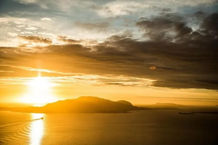 Framed Print : Aerial view of Alesund, Norway at sunrise. Colorful sky over famous tourisitc destination with sunlight and mountains Framed Print : Aerial view of Alesund, Norway at sunrise. Colorful sky over famous tourisitc destination with sunlight and mountains