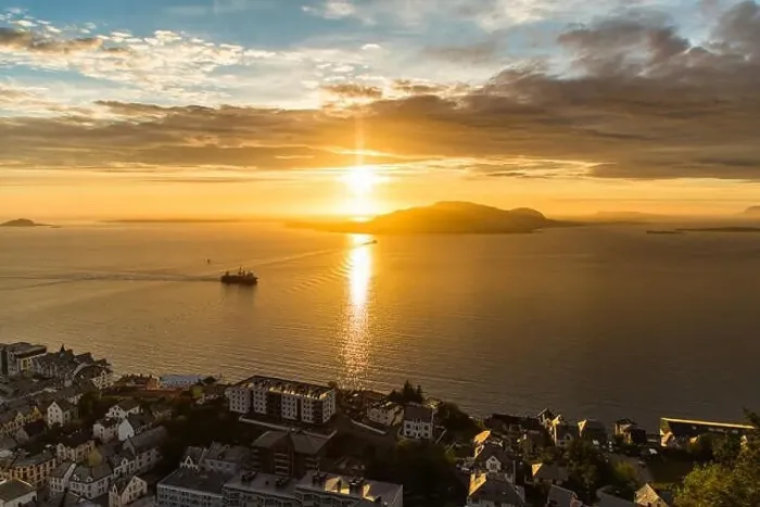 Framed Print : Aerial view of Alesund, Norway at sunrise. Colorful sky over famous tourisitc destination with sunlight and mountains Framed Print : Aerial view of Alesund, Norway at sunrise. Colorful sky over famous tourisitc destination with sunlight and mountains