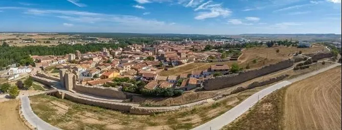 Framed Print : Aerial view of Almazan city walls, fortified gate, battlements above the Ebro river in Spain with cloudy blue sky Framed Print : Aerial view of Almazan city walls, fortified gate, battlements above the Ebro river in Spain with cloudy blue sky