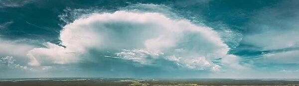 Aerial View. Amazing Natural Dramatic Sky With Rain Clouds Above Countryside Forest Landscape In Summer Cloudy Day. Scenic Sky With Fluffy Clouds On