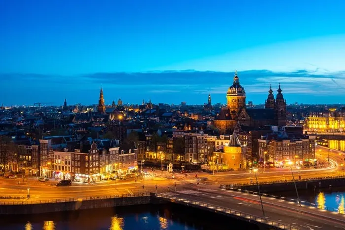 Framed Print : Aerial view of Amsterdam skyline in historical area at night in Amsterdam, Netherlands Framed Print : Aerial view of Amsterdam skyline in historical area at night in Amsterdam, Netherlands