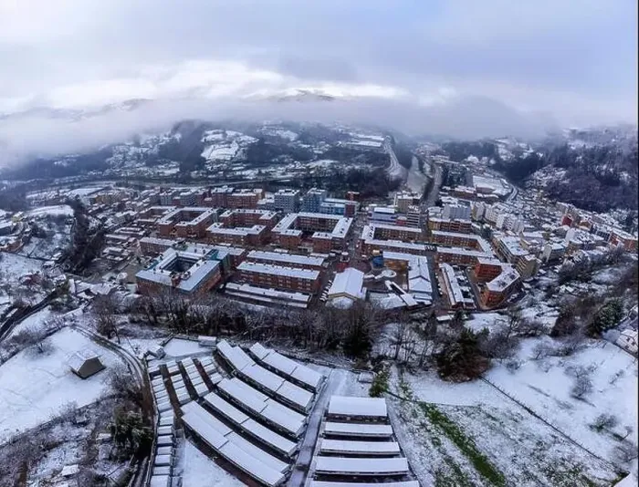 Framed Print : Aerial view of the Asturian town of Blimea under a snowfall, Spain Framed Print : Aerial view of the Asturian town of Blimea under a snowfall, Spain