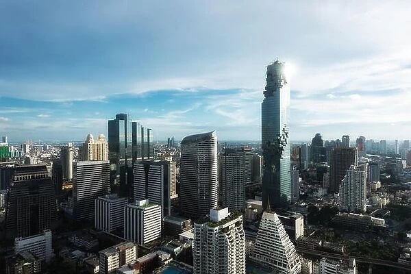 Aerial view of Bangkok modern office buildings, condominium in Bangkok city downtown with sunset sky, Bangkok, Thailand