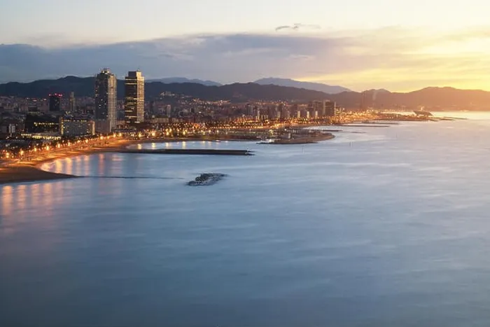 Framed Print : Aerial view of Barcelona Beach in summer night along seaside in Barcelona, Spain. Mediterranean Sea in Spain Framed Print : Aerial view of Barcelona Beach in summer night along seaside in Barcelona, Spain. Mediterranean Sea in Spain