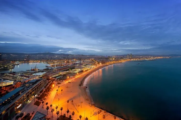 Framed Print : Aerial view of Barcelona Beach in summer night along seaside in Barcelona, Spain. Mediterranean Sea in Spain Framed Print : Aerial view of Barcelona Beach in summer night along seaside in Barcelona, Spain. Mediterranean Sea in Spain