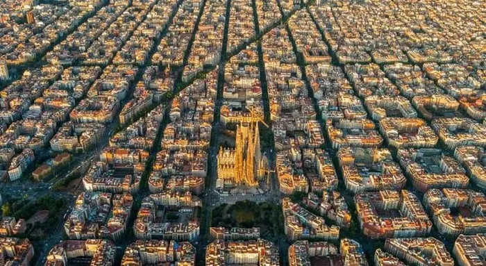 Framed Print : Aerial view of Barcelona Eixample residential district and Sagrada Familia Basilica at sunrise. Catalonia, Spain Framed Print : Aerial view of Barcelona Eixample residential district and Sagrada Familia Basilica at sunrise. Catalonia, Spain