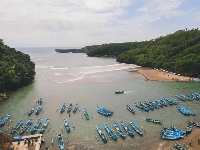 Framed Print : Aerial view of Baron beach in Yogyakarta, Indonesia with lighthouse and traditional boats Framed Print : Aerial view of Baron beach in Yogyakarta, Indonesia with lighthouse and traditional boats
