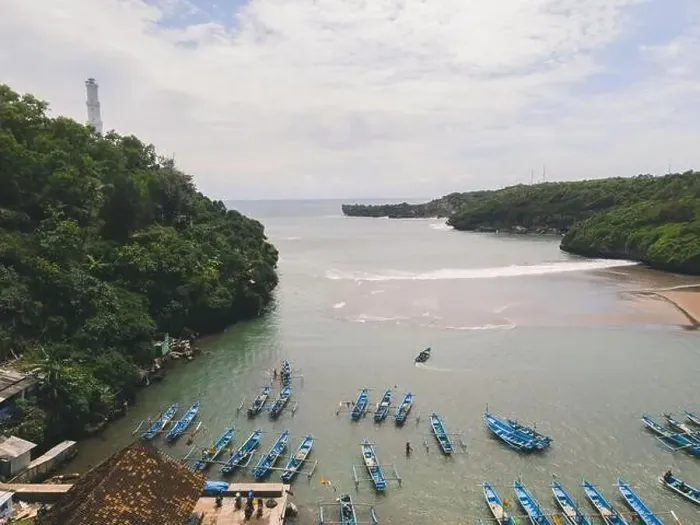 Framed Print : Aerial view of Baron beach in Yogyakarta, Indonesia with lighthouse and traditional boats Framed Print : Aerial view of Baron beach in Yogyakarta, Indonesia with lighthouse and traditional boats