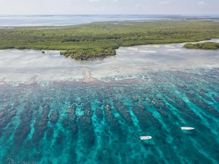 Framed Print : An aerial view of a beautiful coral reef on the edge of Turneffe Atoll off the coast of Belize. This area of the Caribbean is extremely biodiverse