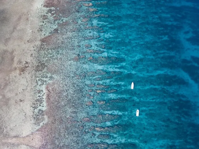 Framed Print : An aerial view of a beautiful coral reef on the edge of Turneffe Atoll off the coast of Belize. This area of the Caribbean is extremely biodiverse