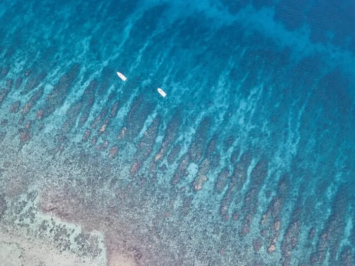 Framed Print : An aerial view of a beautiful coral reef on the edge of Turneffe Atoll off the coast of Belize. This area of the Caribbean is extremely biodiverse Framed Print : An aerial view of a beautiful coral reef on the edge of Turneffe Atoll off the coast of Belize. This area of the Caribbean is extremely biodiverse