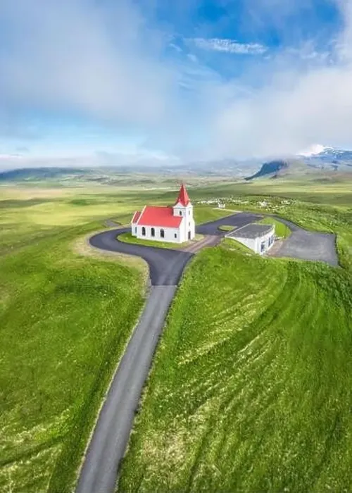 Framed Print : Aerial view of beautiful holy Ingjaldsholskirkja church on hill among the meadow Framed Print : Aerial view of beautiful holy Ingjaldsholskirkja church on hill among the meadow