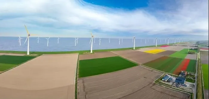 Framed Print : aerial view of a beautiful landscape filled with colorful tulips and wind turbines Framed Print : aerial view of a beautiful landscape filled with colorful tulips and wind turbines