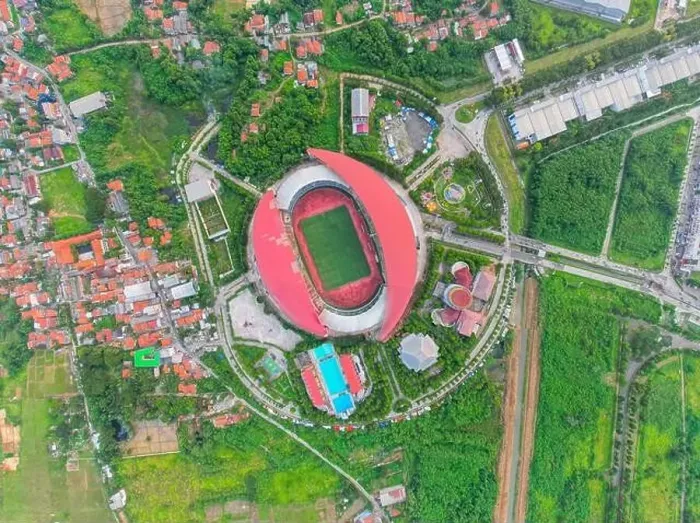 Framed Print : Aerial top down view of the Beautiful scenery of Wibawa Mukti Stadium when sunrise. with Bekasi cityscape background Framed Print : Aerial top down view of the Beautiful scenery of Wibawa Mukti Stadium when sunrise. with Bekasi cityscape background
