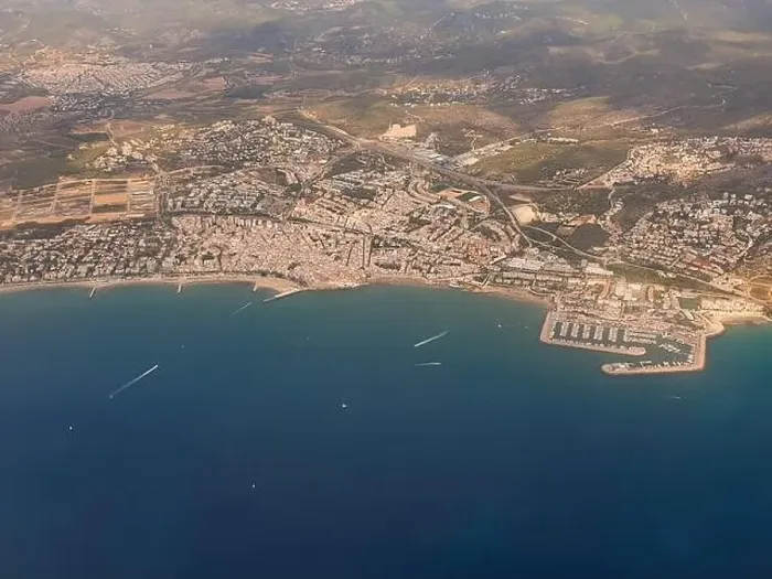 Framed Print : Aerial view on beautiful Sitges town in summer, Spain, view from the plain Framed Print : Aerial view on beautiful Sitges town in summer, Spain, view from the plain