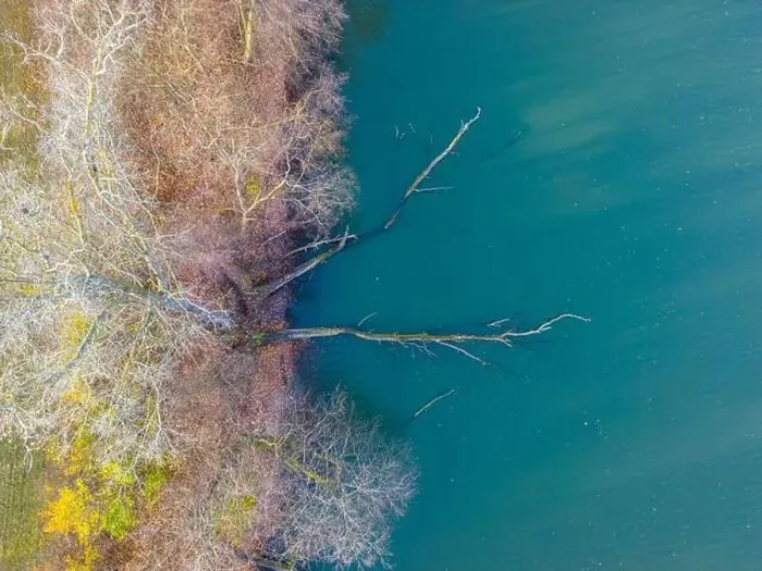 Framed Print : Aerial view of beautiful smooth green waters of a lake on a sunny autumn day Framed Print : Aerial view of beautiful smooth green waters of a lake on a sunny autumn day