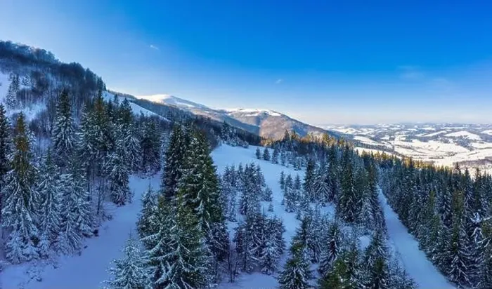 Framed Print : Aerial view of beautiful winter mountain slopes Framed Print : Aerial view of beautiful winter mountain slopes