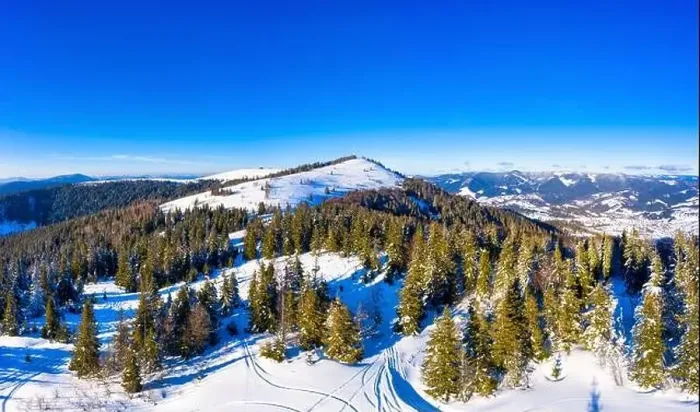 Framed Print : Aerial view of beautiful winter mountain slopes Framed Print : Aerial view of beautiful winter mountain slopes