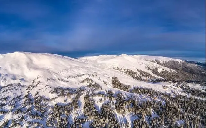 Framed Print : Aerial view of beautiful winter mountain slopes covered with snow and firs forest on a sunny cloudless day Framed Print : Aerial view of beautiful winter mountain slopes covered with snow and firs forest on a sunny cloudless day