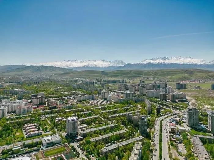 Framed Print : Aerial view of Bishkek city Kyrgyzstan with snow-capped mountains Framed Print : Aerial view of Bishkek city Kyrgyzstan with snow-capped mountains