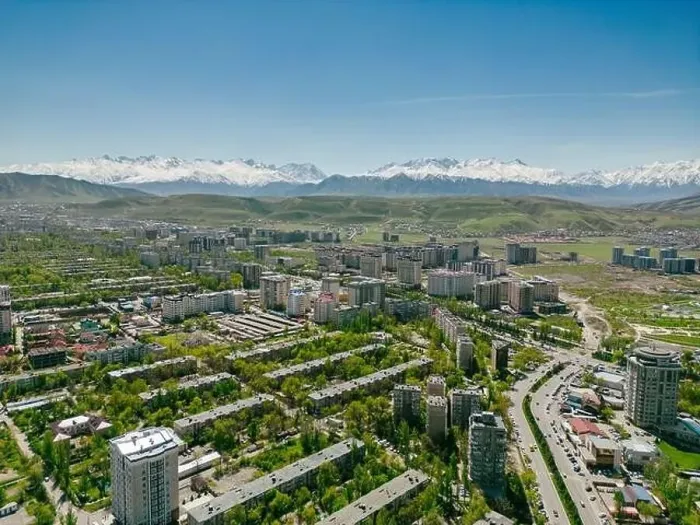 Framed Print : Aerial view of Bishkek city Kyrgyzstan with snow-capped mountains Framed Print : Aerial view of Bishkek city Kyrgyzstan with snow-capped mountains