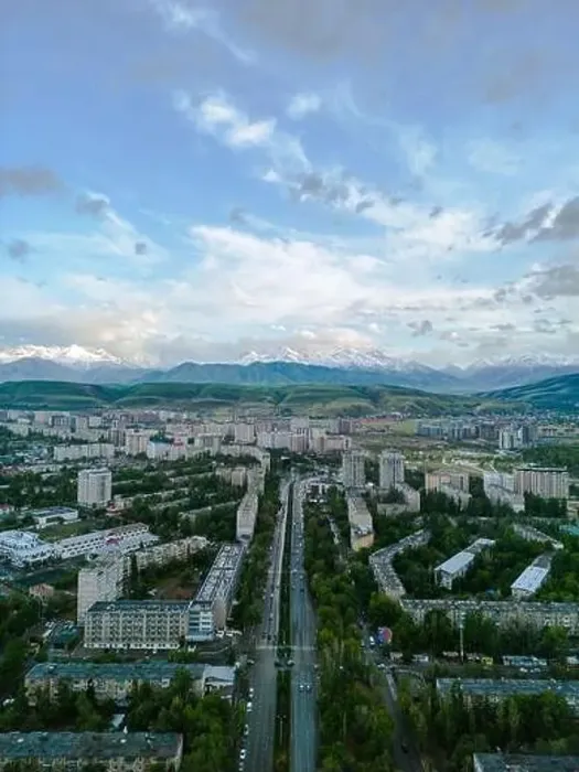 Framed Print : Aerial view of Bishkek city Kyrgyzstan with snowy mountains in the background Framed Print : Aerial view of Bishkek city Kyrgyzstan with snowy mountains in the background