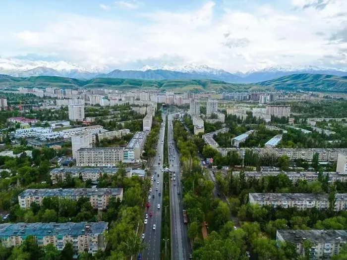 Framed Print : Aerial view of Bishkek city Kyrgyzstan with snowy mountains in the background Framed Print : Aerial view of Bishkek city Kyrgyzstan with snowy mountains in the background