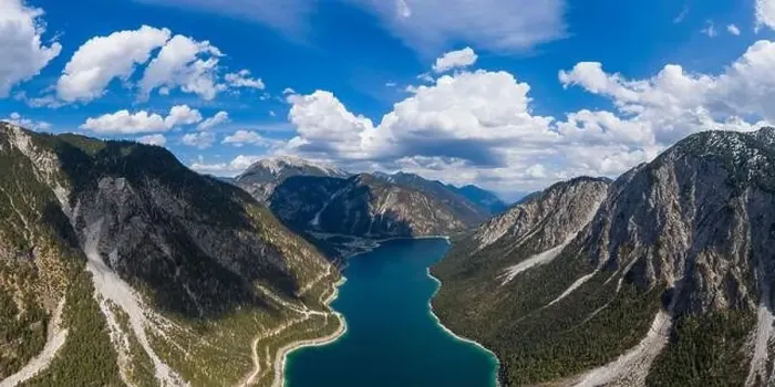 Framed Print : aerial view to blue lake plansee panorama at spring surrounded from tirol mountain alps