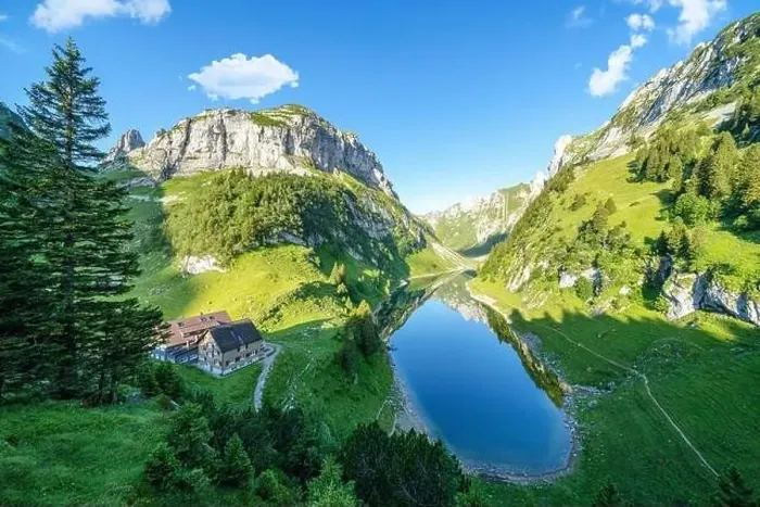 Framed Print : Aerial view of Bollenwees Hutte chalet on shores of Falensee lake, Appenzell Canton, Alpstein Range, Switzerland Framed Print : Aerial view of Bollenwees Hutte chalet on shores of Falensee lake, Appenzell Canton, Alpstein Range, Switzerland