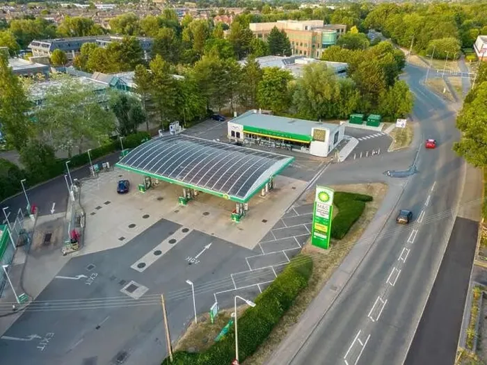 Framed Print : Aerial view of BP petrol station showing high UK fuel price sign Framed Print : Aerial view of BP petrol station showing high UK fuel price sign