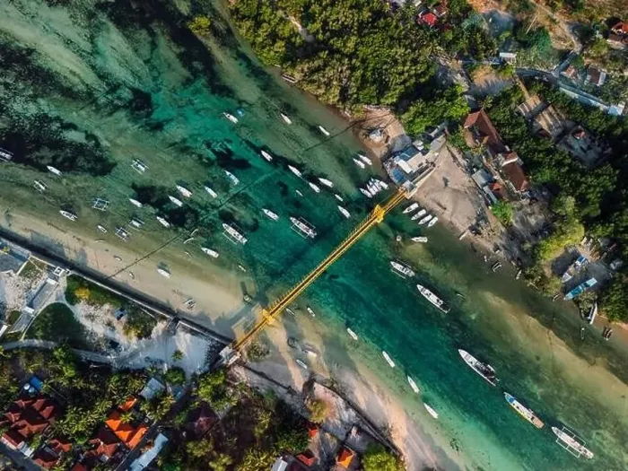 Framed Print : Aerial view of a bridge connecting two tropical islands over a narrow ocean channel Framed Print : Aerial view of a bridge connecting two tropical islands over a narrow ocean channel