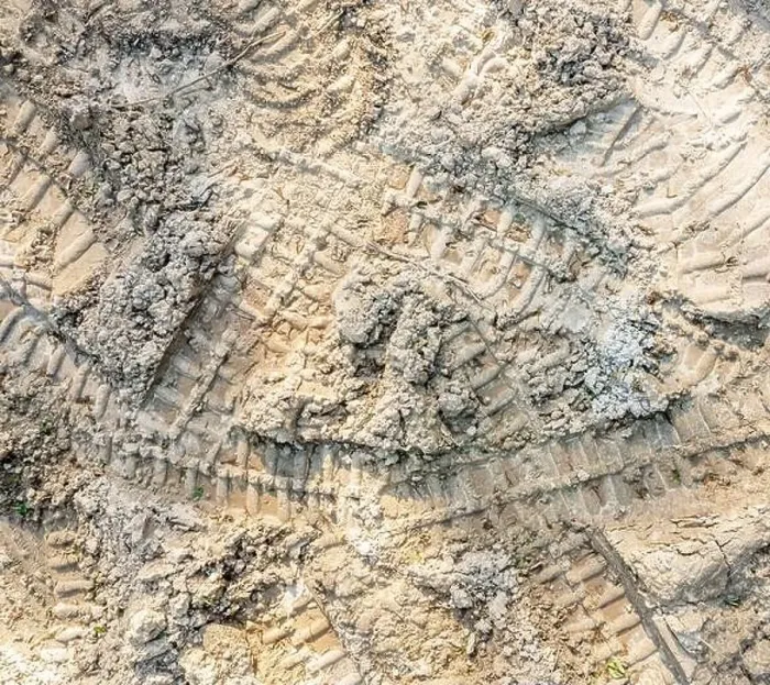 Framed Print : Aerial view of bulldozer tracks in dirt Framed Print : Aerial view of bulldozer tracks in dirt