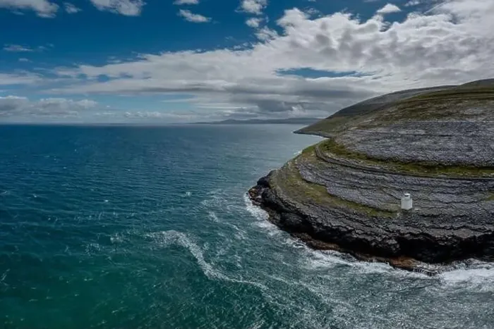 Framed Print : An aerial view of the Burren Coast in County Clare with the Black Head Lighthouse on the rocky point Framed Print : An aerial view of the Burren Coast in County Clare with the Black Head Lighthouse on the rocky point