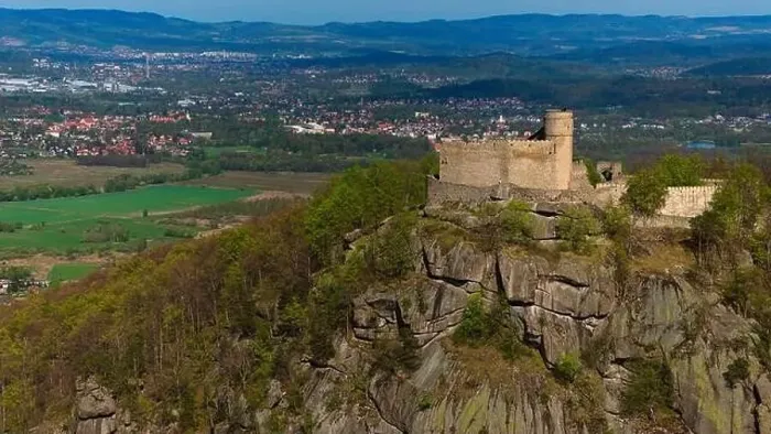 Framed Print : An aerial view captures the medieval Chojnik Castle atop a mountain in the Karkonosze range Framed Print : An aerial view captures the medieval Chojnik Castle atop a mountain in the Karkonosze range