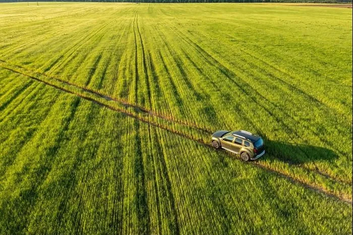 Framed Print : Aerial view of car SUV parked near countryside road in field rural landscape. Bird's-eye drone view of car SUV parked near countryside road in summer Framed Print : Aerial view of car SUV parked near countryside road in field rural landscape. Bird's-eye drone view of car SUV parked near countryside road in summer