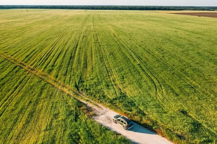 Framed Print : Aerial view of car SUV parked near countryside road in field rural landscape. Bird's-eye drone view of car SUV parked near countryside road in summer Framed Print : Aerial view of car SUV parked near countryside road in field rural landscape. Bird's-eye drone view of car SUV parked near countryside road in summer