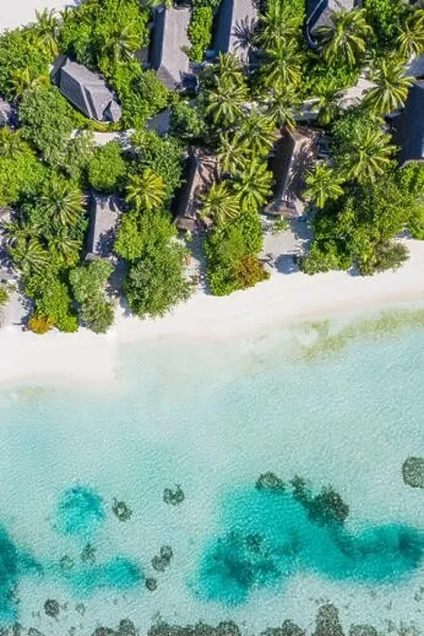 Framed Print : Aerial view of Caribbean resort. Top view of amazing tropical landscape, shallow sea lagoon, relax sandy beach and palm trees around villas, bungalows