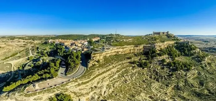 Framed Print : Aerial view of Chinchilla de Montearagon castle with ruined excavated inner building remains surrounded by an outer Framed Print : Aerial view of Chinchilla de Montearagon castle with ruined excavated inner building remains surrounded by an outer