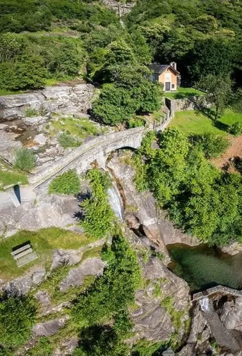 Framed Print : Aerial view of the church and waterfall of Santa Petronilla located in Biasca town Framed Print : Aerial view of the church and waterfall of Santa Petronilla located in Biasca town