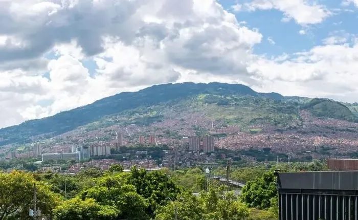 Framed Print : Aerial View of the City of Medellin Surrounded by Mountains, many Buildings, Houses, Trees in a Beautiful Landscape Framed Print : Aerial View of the City of Medellin Surrounded by Mountains, many Buildings, Houses, Trees in a Beautiful Landscape