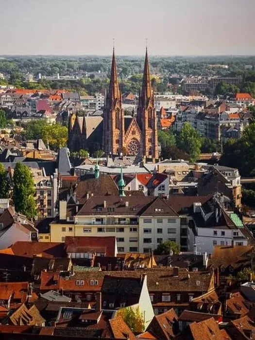 Framed Print : Aerial view of the city of Strasbourg. Sunny day. Red tiled roofs. Small, like the toy houses of the old city Framed Print : Aerial view of the city of Strasbourg. Sunny day. Red tiled roofs. Small, like the toy houses of the old city