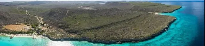 Framed Print : Aerial view of the coast of Curaçao in the Caribbean with beach, cliff, and turquoise ocean Framed Print : Aerial view of the coast of Curaçao in the Caribbean with beach, cliff, and turquoise ocean