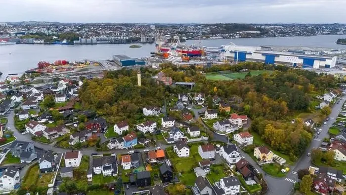Framed Print : Aerial view of a coastal town with residential houses Framed Print : Aerial view of a coastal town with residential houses