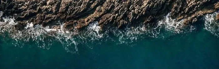 Framed Print : Aerial view of crashing waves on rocks Framed Print : Aerial view of crashing waves on rocks